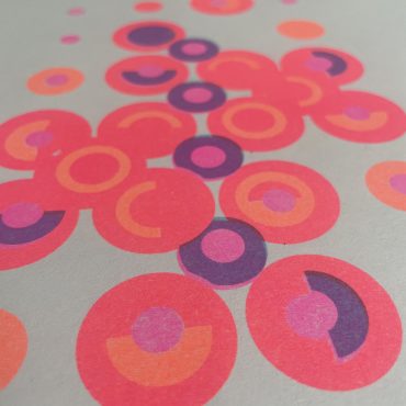 Close up image of a risograph printed abstract design on uncoated paper